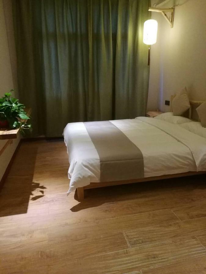 Right Here Hotel Dunhuang Esterno foto